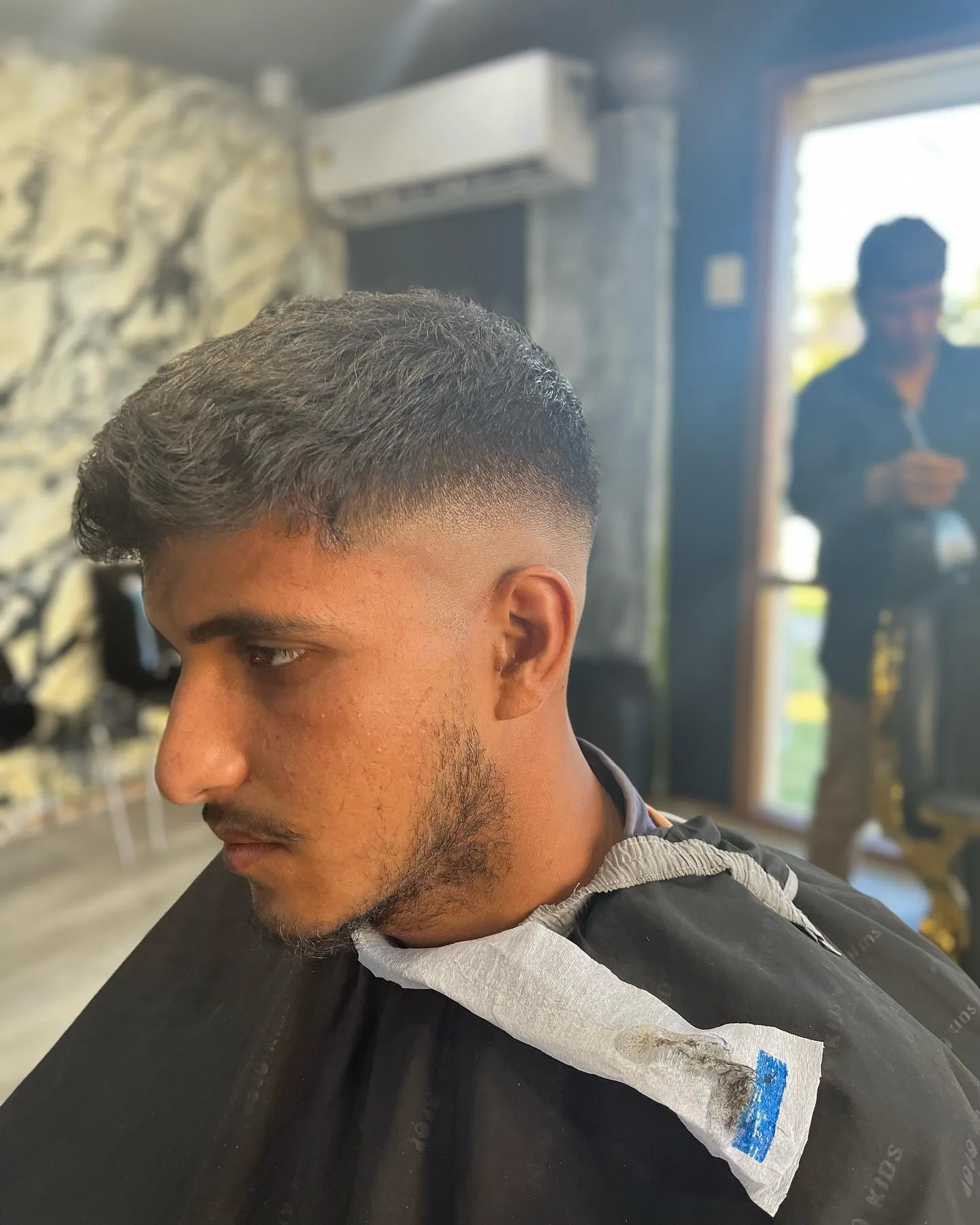 Textured crop mid fade — GKF Barber Camberwell